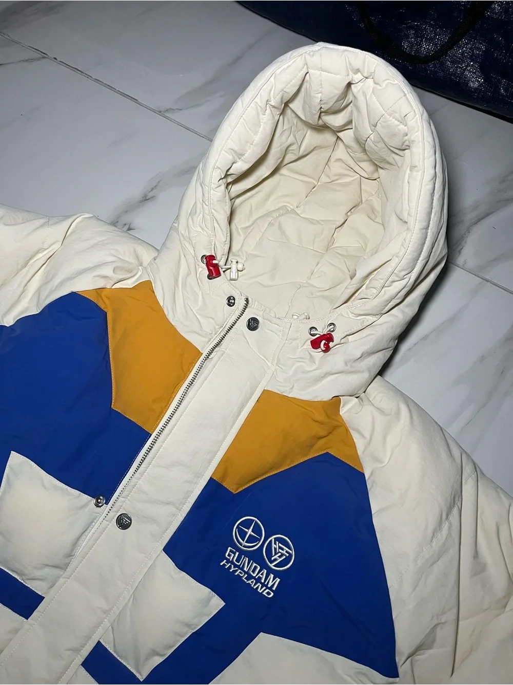 Hypland Gundam Reversible Colorblock Puffer Jacket - Cream/Blue/Red/Yellow